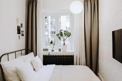 Łóżko lub łóżka w pokoju w obiekcie Bunga Apartament