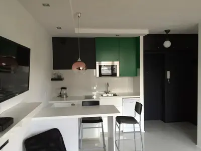 Kuchnia lub aneks kuchenny w obiekcie Emerald Mokotowska 59