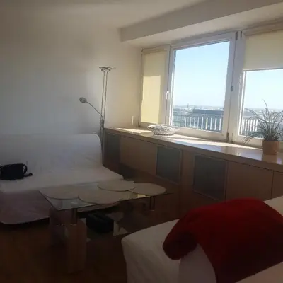 Łóżko lub łóżka w pokoju w obiekcie Alma Apartments