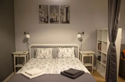 Łóżko lub łóżka w pokoju w obiekcie Studio Panorama 