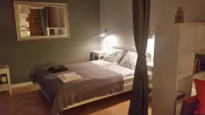 Łóżko lub łóżka w pokoju w obiekcie Studio Panorama 
