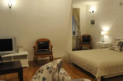 Łóżko lub łóżka w pokoju w obiekcie MiłoTu - Apartament Uniwersytecki