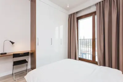 Łóżko lub łóżka w pokoju w obiekcie Platinum Residence Mokotów