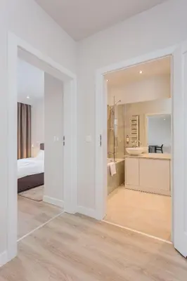 Łóżko lub łóżka w pokoju w obiekcie Platinum Residence Mokotów