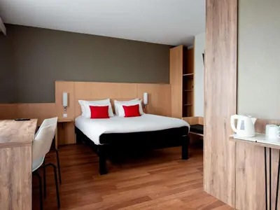 Łóżko lub łóżka w pokoju w obiekcie Ibis Warszawa Stare Miasto