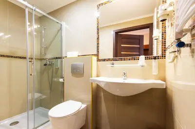 Łazienka w obiekcie Hit Hotel
