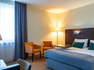 Łóżko lub łóżka w pokoju w obiekcie Mercure Warszawa Airport