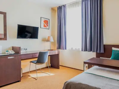 Telewizja i/lub zestaw kina domowego w obiekcie Mercure Warszawa Airport