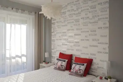 Łóżko lub łóżka w pokoju w obiekcie Apartament Kabaty