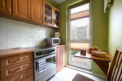 Kuchnia lub aneks kuchenny w obiekcie P&O Apartments Bielany