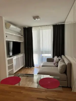 Telewizja i/lub zestaw kina domowego w obiekcie Coser Apartamenty Centrum