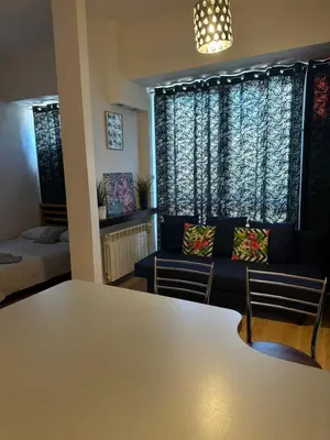 Łóżko lub łóżka w pokoju w obiekcie Coser Apartamenty Centrum