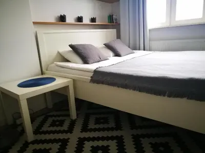 Łóżko lub łóżka w pokoju w obiekcie Apartament blisko Centrum