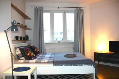 Łóżko lub łóżka w pokoju w obiekcie Apartament blisko Centrum