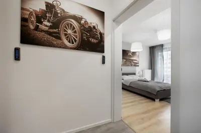 Łóżko lub łóżka w pokoju w obiekcie SilverApartments