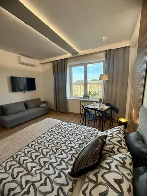 Łóżko lub łóżka w pokoju w obiekcie Exclusive Apartments Smolna