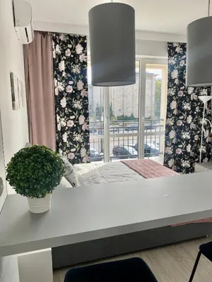 Łóżko lub łóżka w pokoju w obiekcie Exclusive Apartments Smolna