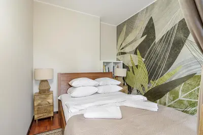 Łóżko lub łóżka w pokoju w obiekcie Westfield Arkadia P&O Serviced Apartments