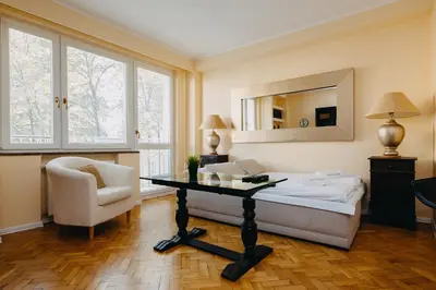 Łóżko lub łóżka w pokoju w obiekcie ShortStayPoland Warecka (B2)