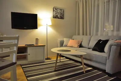 Telewizja i/lub zestaw kina domowego w obiekcie Sleep4you Apartamenty Centrum