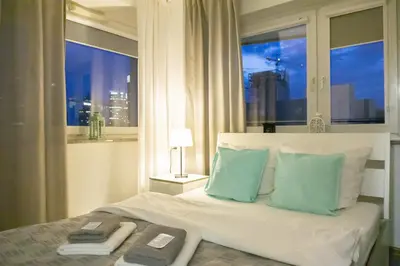 Łóżko lub łóżka w pokoju w obiekcie Sleep4you Apartamenty Centrum