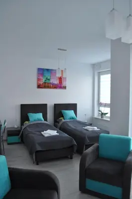 Łóżko lub łóżka w pokoju w obiekcie Pop Art Apartments