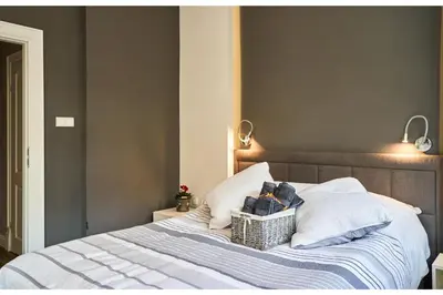 Łóżko lub łóżka w pokoju w obiekcie Kredytowa Warsaw Apartment