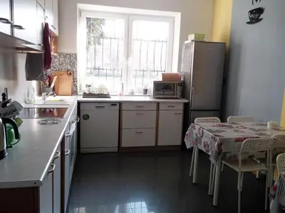 Kuchnia lub aneks kuchenny w obiekcie Mira Rent House
