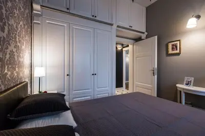 Łóżko lub łóżka w pokoju w obiekcie Poznanska 13 Apartment