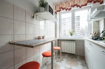 Kuchnia lub aneks kuchenny w obiekcie Center Warsaw - Apartament Jana Pawła