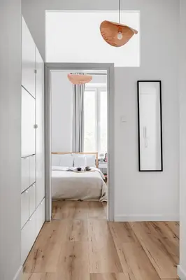 Łóżko lub łóżka w pokoju w obiekcie oompH Warsaw Nowy Swiat Apartment
