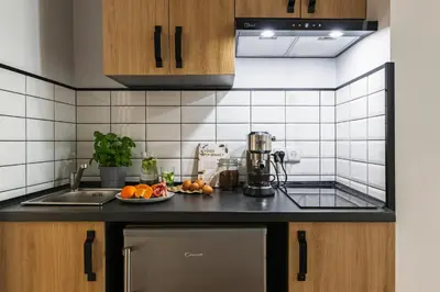 Kuchnia lub aneks kuchenny w obiekcie oompH Warsaw Nowy Swiat Apartment
