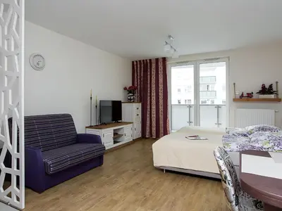 Telewizja i/lub zestaw kina domowego w obiekcie Manhattan Place Apartament