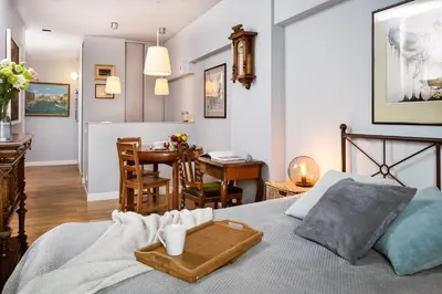 Łóżko lub łóżka w pokoju w obiekcie Apartament Triton Park