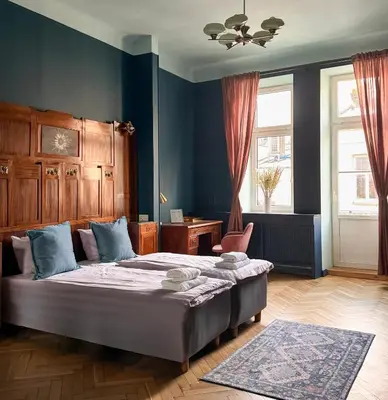 Łóżko lub łóżka w pokoju w obiekcie 4th Floor Bed and Breakfast