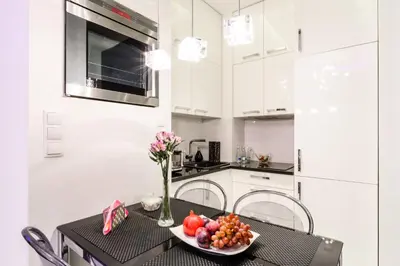 Kuchnia lub aneks kuchenny w obiekcie Marszałkowska 140 by Homeprime