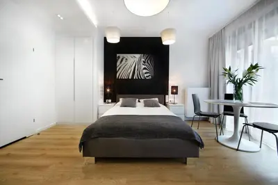 Łóżko lub łóżka w pokoju w obiekcie Kalia Apartments