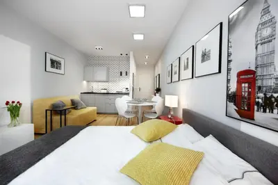 Łóżko lub łóżka w pokoju w obiekcie Kalia Apartments