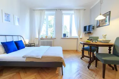 Łóżko lub łóżka w pokoju w obiekcie Rental Apartments Bednarska