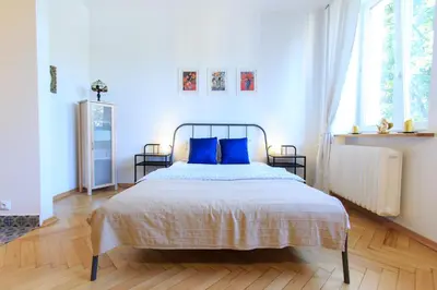 Łóżko lub łóżka w pokoju w obiekcie Rental Apartments Bednarska