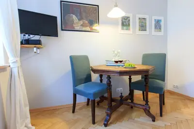 Telewizja i/lub zestaw kina domowego w obiekcie Rental Apartments Bednarska