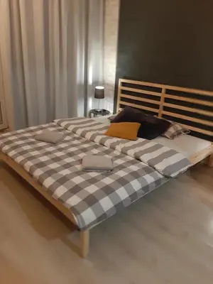 Łóżko lub łóżka w pokoju w obiekcie Marszałkowska Apartament 138