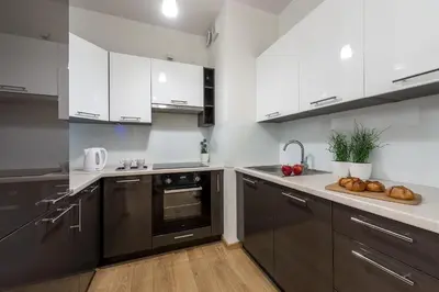 Kuchnia lub aneks kuchenny w obiekcie Wola Park - Obozowa 16 P&O Apartments