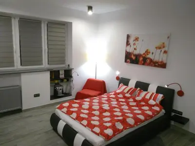 Łóżko lub łóżka w pokoju w obiekcie Apartament Salezego