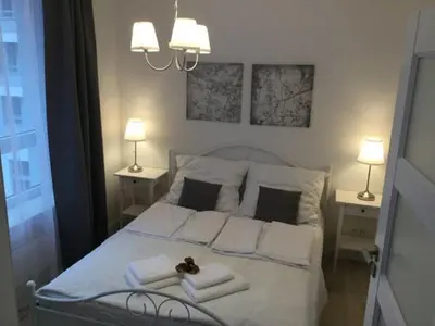 Łóżko lub łóżka w pokoju w obiekcie Apartament Słodowiec Metro, Free parking