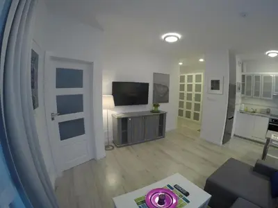 Telewizja i/lub zestaw kina domowego w obiekcie Apartament Słodowiec Metro, Free parking
