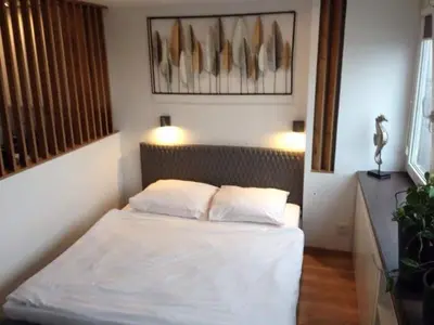 Łóżko lub łóżka w pokoju w obiekcie Alma Apartments Smolna