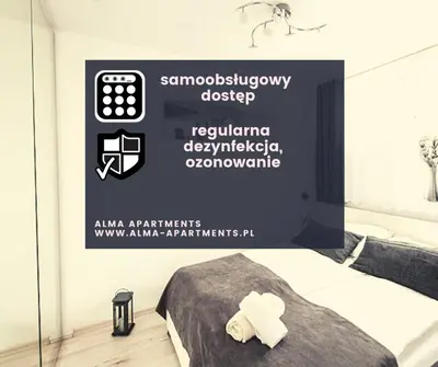 Łóżko lub łóżka w pokoju w obiekcie Alma Apartments Smolna