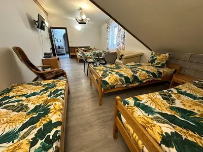 Łóżko lub łóżka w pokoju w obiekcie Guest House Villa Arkadia