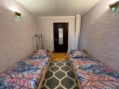 Łóżko lub łóżka w pokoju w obiekcie Guest House Villa Arkadia